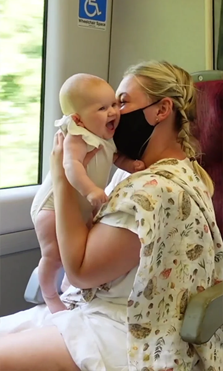 A mother and baby travelling together on a Trainline campaign shoot